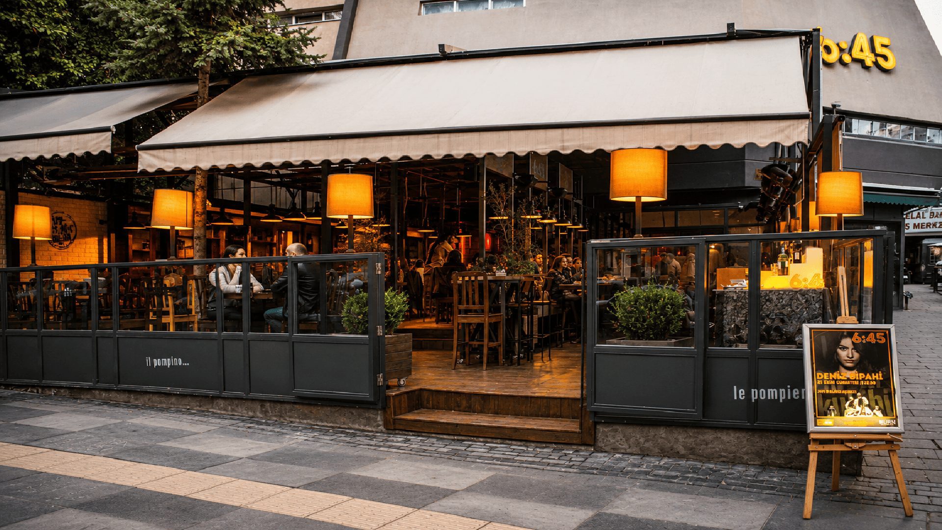 6:45 Pub teras girişi ve sarkıt lambalar